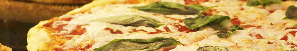 Eating Italian Pizza Sandwich at Faccia Luna Pizzeria restaurant in State College, PA.